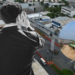 Businessman on a Rooftop Overlooking a City, with a Circular Inset Showing a Green-and-white Passenger Train on Tracks. - Tu Vecino Informa