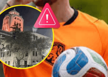 Soccer player in orange holding a ball; inset shows a night-time building inside a yellow circle with a pink warning symbol, indicating a safety alert.